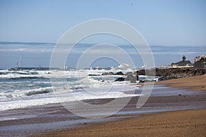 Praia de Carnero, beach in Porto with big waves of the ocean photo