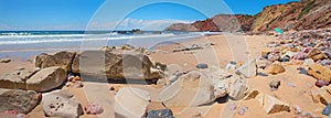 PRAIA DO AMADO, CARRAPATEIRA, PORTUGAL, June 18th 2019 - beautiful surfer beach west algarve, with colorful stones