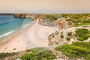 Beautiful bay and sandy beach of Praia do Beliche near Cabo Sao Vicente, Algarve region, Portugal photo