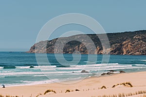 Praia do Guincho is a popular Atlantic beach located on Portugal\'s Estoril coast, 5km from the town of Cascais, Portugal