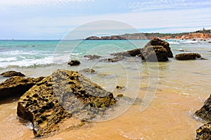Tres Castelos beach shoreline, Portimao, Algarve Portugal photo