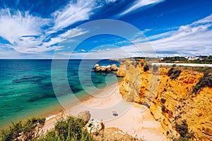 Praia dos Tres Castelos in south Portugal, Portimao, Algarve region. Landscape with Atlantic Ocean, shore and rocks in Tres