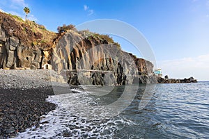 Praia Formosa beach in south Madeira with black rock, Portugal