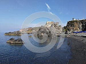 Praia a Mare - Scenery of the Fiuzzi Tower from the beach