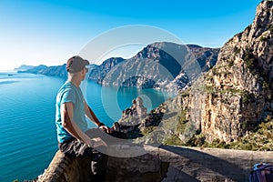Praiano - Man enjoying the scenic view from hiking trail between Positano and Praiano at the Amalfi Coast, Campania, Italy, Europe