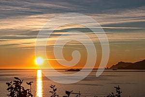 Praiano - Scenic sunset behind the Li Galli islands in the Mediterranean Sea. View from Positano,  Amalfi Coast, Italy, Europe.