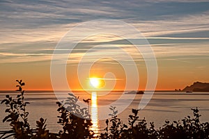 Praiano - Scenic sunset behind the Li Galli islands in the Mediterranean Sea. View from Positano,  Amalfi Coast, Italy, Europe.