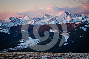 Praire mountain lookout on the top at the sunrise time, camping on the top, windy morning, beautiful pink sunrise in the mountains photo