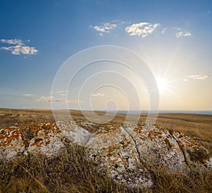 Prairie with huge stones at the sunset