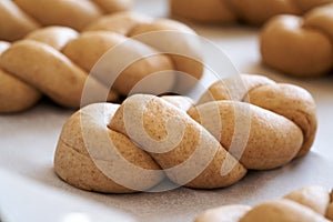Praparation of braided bread buns from whole grain spelt flour