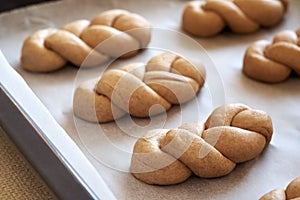 Praparation of braided bread rolls from whole grain spelt flour