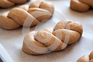 Praparation of plaited bread buns from whole grain spelt flour