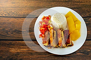 prato feito, a typical Brazilian food that comes with rice, cass photo