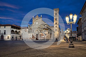 Prato, Italy. Piazza del Duomo and Cathedral at dusk photo