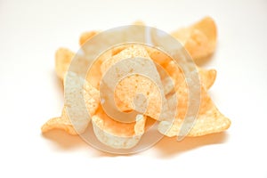 Prawn crackers chips isolated on white background - homemade crunchy prawn crackers or shrimp crisp rice traditional snack