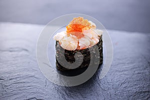 Prawn gunkan maki, served on black slate