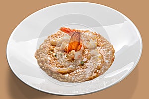 Prawn risotto in white plate photo