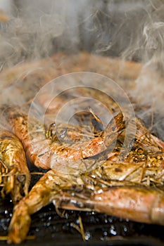 Prawns on a barbecue plate