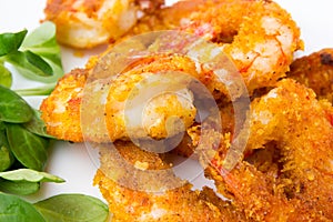 Fried prawns on a white background.