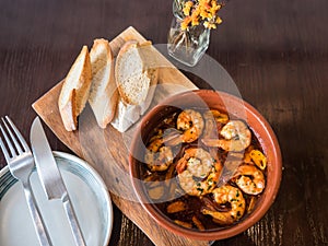 Prawns fried in virgin olive oil with bread