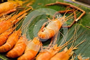 Prawns grilled on a street market in Bangkok, Thailand