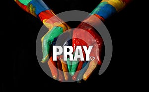 Pray concept on Multi Colors Painted hand