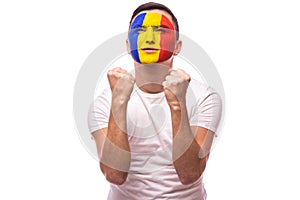 Pray and cry emotions for Romanian football fan in game of Romania national team