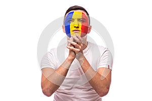 Pray and cry Romanian football fan in game of Romania national team