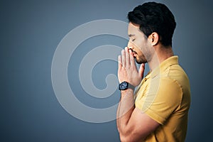Pray, faith and mockup with a man in studio on a gray background asking god for a miracle or help. Trust, religion and