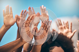 Pray, hands and people praying against blue sky, united for religion, worship and praise outdoors. Community, church and