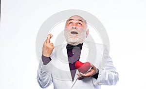 Pray for love. love and romance. valentines day. donor transplant. happy mature man hold red heart. bearded businessman