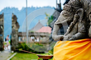 Pray and offering to Ganesha in Bali