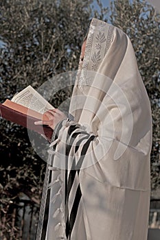 Pray prayerbook and blowing the shofar of Rosh Hashanah