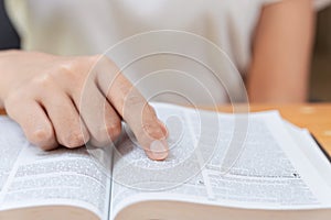 Pray and religion concept, Female christian read holy bible to studying of faith and spirituality