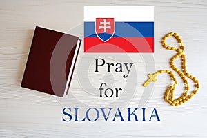 Pray for Slovakia. Rosary and Holy Bible background