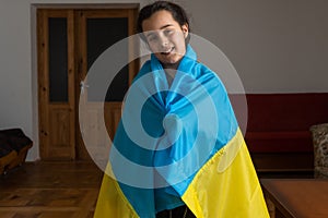 Pray for Ukraine. Child with Ukrainian flag. little girl with ukraine flag