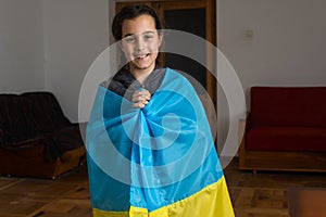 Pray for Ukraine. Child with Ukrainian flag. little girl with ukraine flag