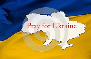 Pray for Ukraine on National yellow blue flag of Ukraine