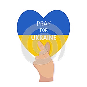 Pray for Ukraine on yellow and blue heart background. Korean heart gesture. Love Ukraine, no war support