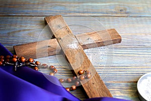 Prayer almsgiving fasting Ash Wednesday concept with wooden cross