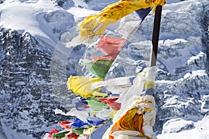 Prayer buddhist flags fluttering in the wind. Nepal photo
