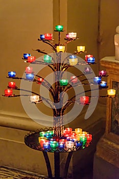 Prayer candles at church of the Santissima Trinita dei Monti. Rome. Italy