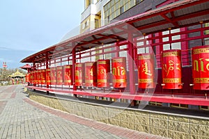 Prayer drums in the Buddhist complex  `Golden Abode of Buddha Shakyamuni.` Elista, Kalmykia. Tibetan text