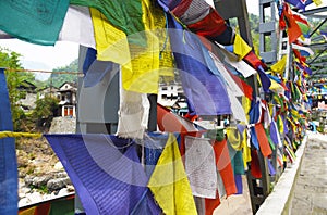 The prayer flag on a bridge in Poon Hill, Nepal