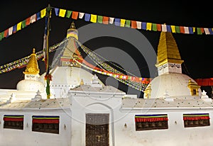 Prayer flags and Bodhnath stupa in Kathmandu, Nepal