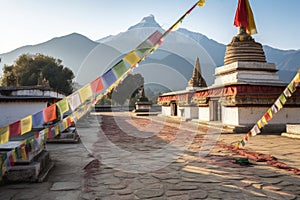 prayer flags with buddhist stupa in the background