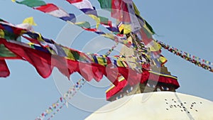 Prayer flags flying from Boudhanath Stupa, Buddhist Temple naer Kathmandu, Nepal