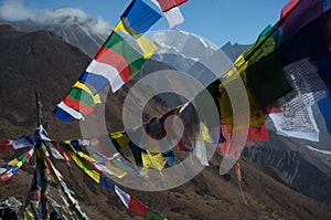 Prayer flags leading at Kyangjin Ri. Tibetan region