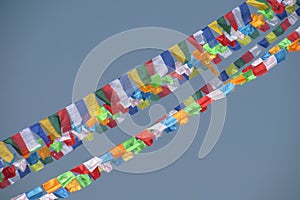 Prayer flags in Nepal trekking at Himalaya mountains