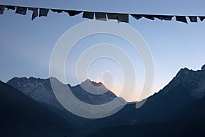 Prayer flags at sunrise, Everest trek, Himalaya mountains, Nepal
